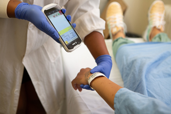 Leah Jaikaran demonstrates how positive patient ID works when drawing blood at the bedside. Leah Jaikaran demonstrates how positive patient ID works when drawing blood at the bedside.