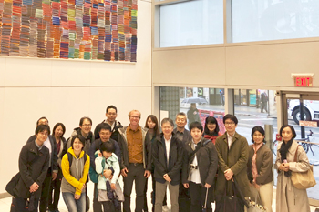 The group poses for a photo after a tour of the Upstream Lab Research Institute. The group poses for a photo after a tour of the Upstream Lab Research Institute.