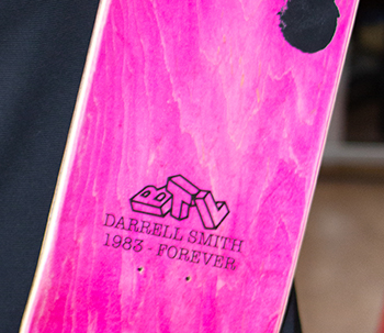 A closeup of the skateboard designed with Three Wishes.