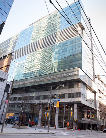 Peter Gilgan Patient Care tower viewed from Queen St. East.