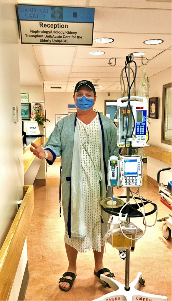 Bob Reid, walking the hospital hallways a day after surgery.