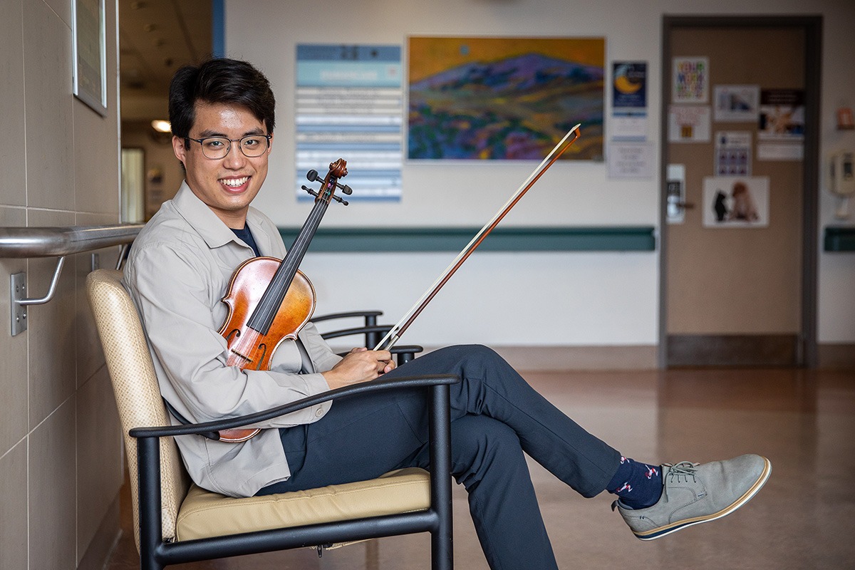 ‘Music heals’ Medical resident plays violin concert for patients at St