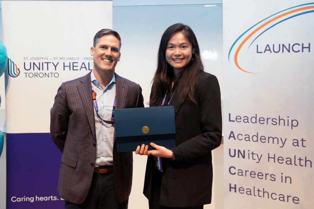 Emily Huang (right) with Manson Locke, Vice President, People & Chief Human Resources Officer